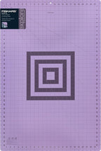 Fiskars Self Healing Cutting Mat with Grid for Sewing, Quilting, and Crafts - 24" x 36 Grid Lilac/Mountain Haze